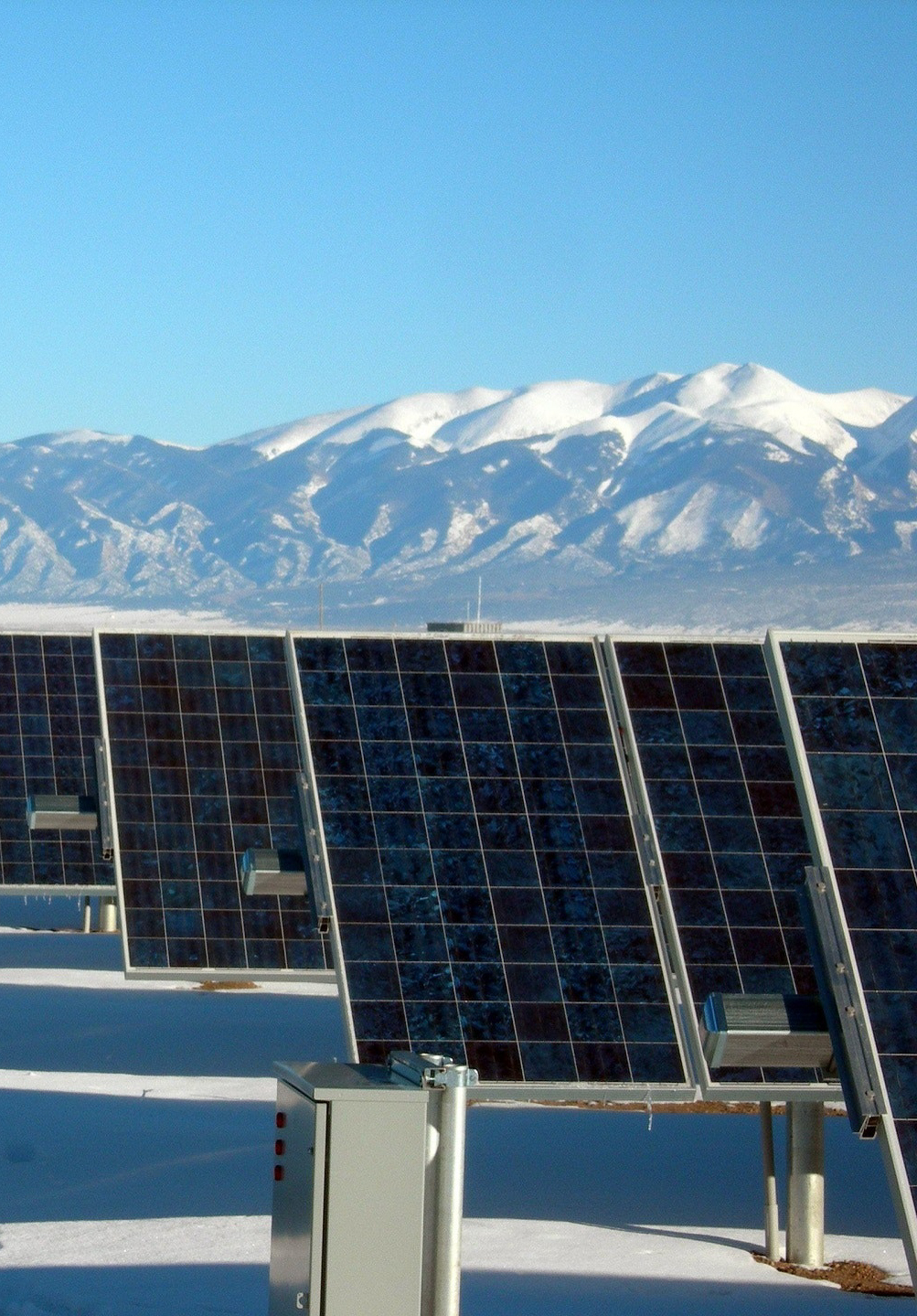 silver-and-black-solar-panels-on-snow-covered-ground-159160-2